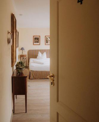 Glueckstadt House | Discover Pension Am Museum: Top-Rated with Hot Tub & Dining