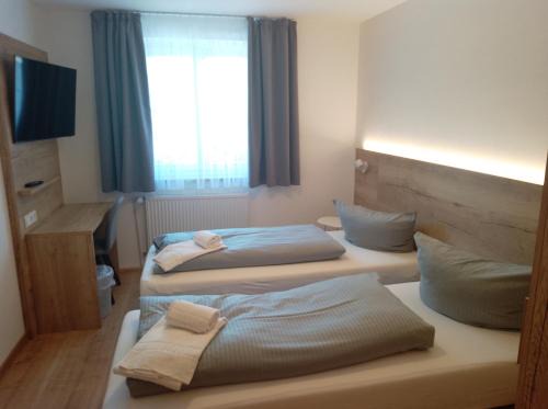 Dachau District House | Discover Pension Mair: Family-Friendly with Kitchen Amenities