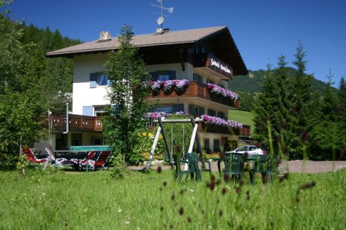 Pedraces Hotel | Family-Friendly Stay at Pension Enzian with Kitchen Access