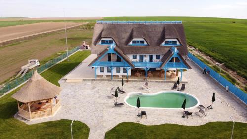 Razim Lake House | Oceanfront Retreat at Pensiunea Dolosman - Rated 9.5/10