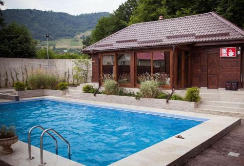 Baia de Aries House | Discover Pensiunea Roua Muntelui with Oceanfront Amenities