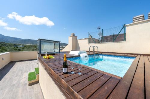 Sant Carles de la Rapita Apartment | Elegant Penthouse Duplex with Private Pool Access