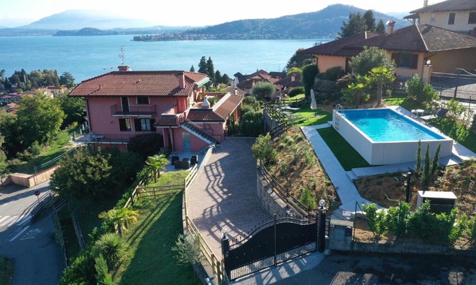 Meina Apartment | Experience Penthouse Andrea: Oceanfront Escape with Pool