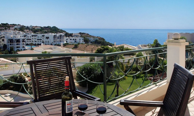Porto de Mos Apartment | Beachfront Penthouse with Ocean Views and Pool Access
