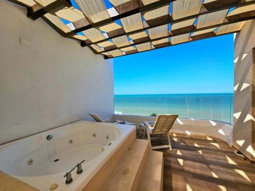 Chicxulub Puerto Apartment | Oceanfront Penthouse in Chicxulub with Hot Tub