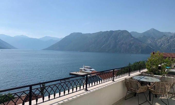 Dobrota Apartment | Bayfront Penthouse: Family-Friendly with Perfect Ratings