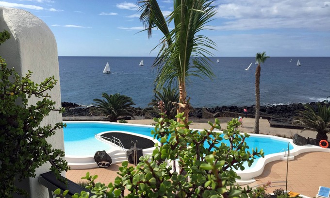 Costa Teguise Condo | Sea-Side Penthouse with Infinity Pool & Ocean Views