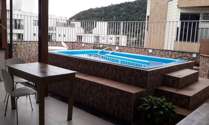 Parque Enseada Apartment | Beachfront Penthouse with Pool & Private Barbecue in Guarujá