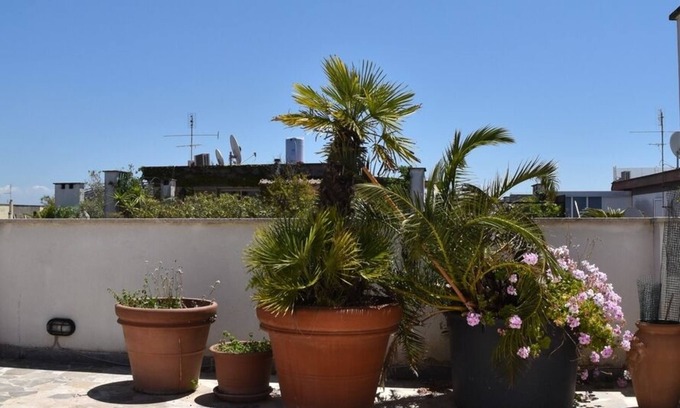 Quartiere XXXIV Lido di Ostia Levante Apartment | Penthouse with Panoramic Terrace and Ocean View in Ostia