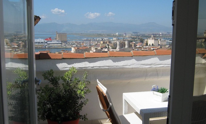 Cagliari Apartment | Elegant Penthouse with Panoramic Terrace and Ocean Views