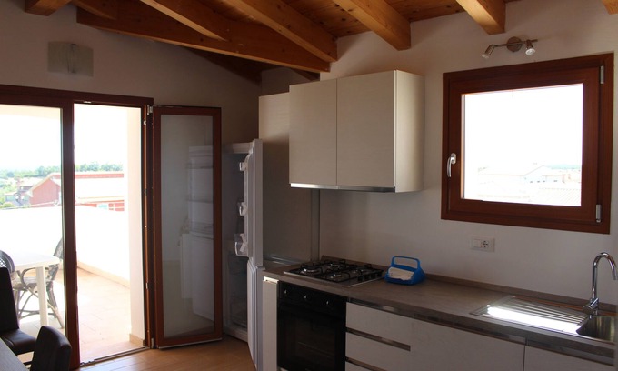 Budoni Apartment | Oceanfront Penthouse with Scenic Sea Views and Beach Access
