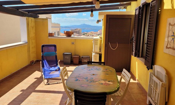 La Maddalena Apartment | Elegant Penthouse with Terrace, Steps from Palau Center