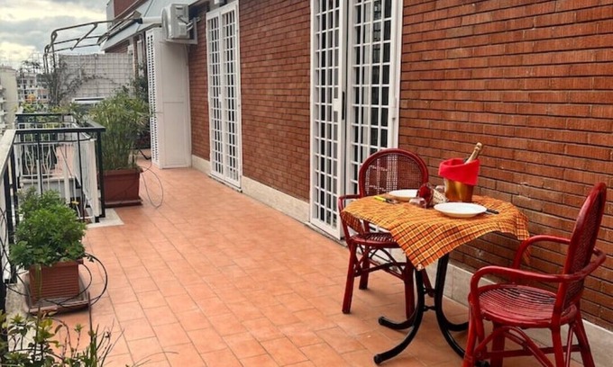 Tuscolano Apartment | Stylish Penthouse with Terrace in Central Metro Area