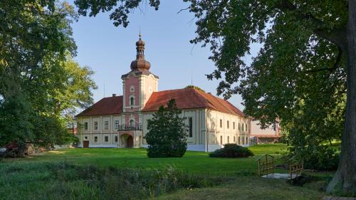 Lesany House | Discover Penzion Zámek Lešany: Pet Friendly & Pool Access