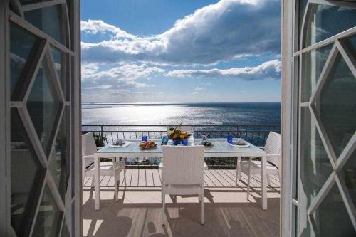 Sirenuse Apartment | Peony Apartment: Breathtaking Sea View & Hot Tub Bliss
