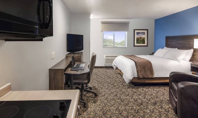 Midland Hotel | Perfect Rest Stop: Climate-Controlled Room w/Pet-Friendly Kitchen Access!