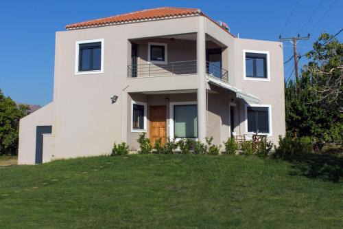 Eresos-Antissa House | Explore Perivoli House A: Family-Friendly Pet Retreat