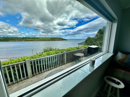Youghal House | PERIWINKLE COTTAGE, with the most amazing sea view