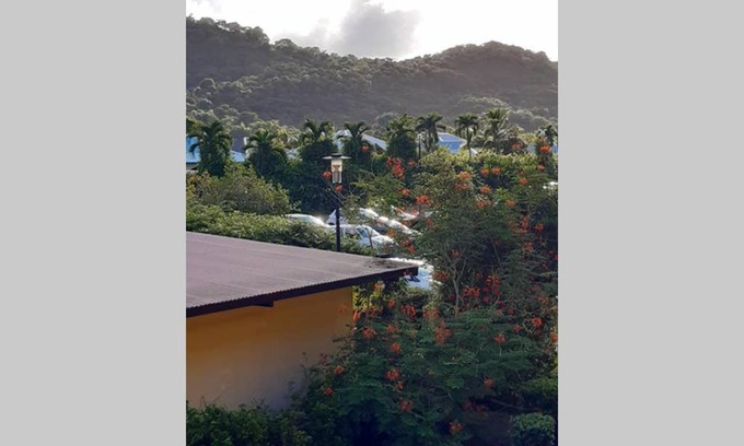 Cayenne Apartment | Oceanfront Retreat at Perle des mers with Pool & Hot Tub