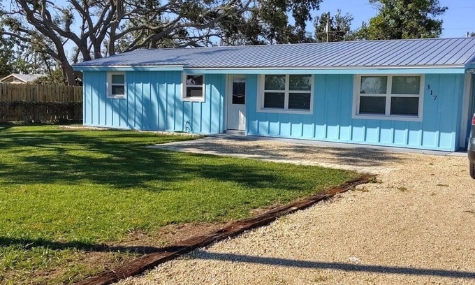 Port St. Joe Cottage | Pet Friendly Cottage Near Beach with Fenced Yard and Pool
