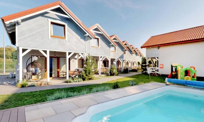 Karwia House | Beachfront Vacation Home with Pool Access & Ocean View