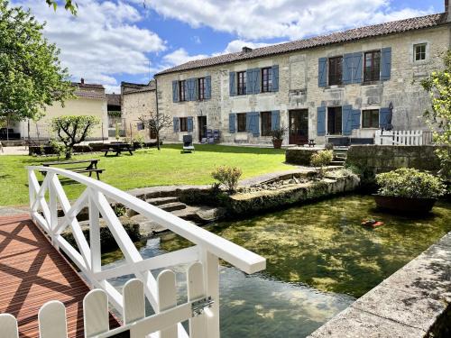 Bourg-Charente House | Elegant Petit Moulin De Veillard with Oceanfront Views