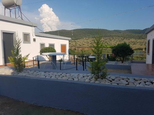 Ksamil House | Oceanfront Paradise: Petrit Guesthouse with Great Reviews