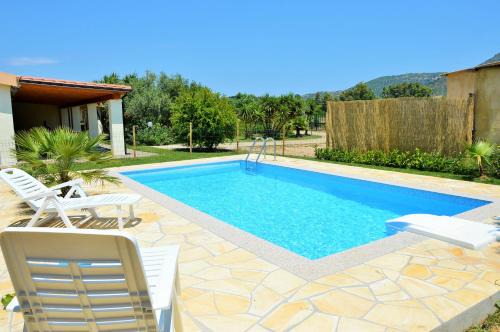 Muravera House | Petrus Vacanze: Oceanfront Escape with Pool & High Ratings