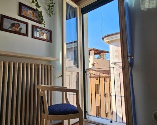 Centro Storico Nord Apartment | Discover Petry's Home: Stylish Loft with Family-Friendly Perks