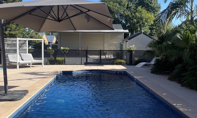 Tocumwal House | Experience Peyton's Place: Five Bedroom Villa with Spa & Pool