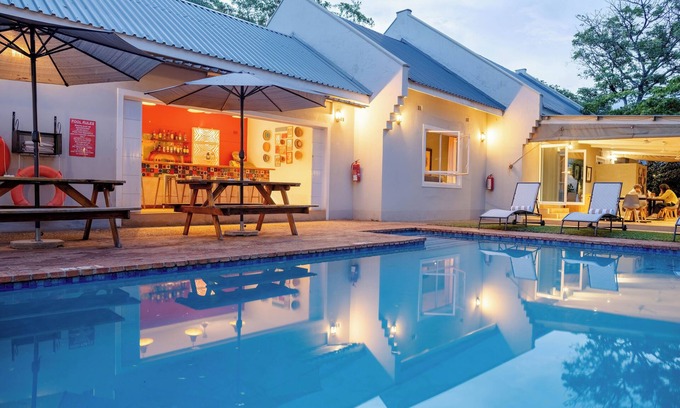 Victoria Falls Cabin | Exceptional PheZulu Guest Lodge: Top-Rated with Pool & Dining