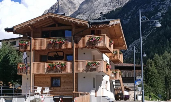 Penia Apartment | Guest Favorite: Piccola Cesa Apartments for Families & Pets