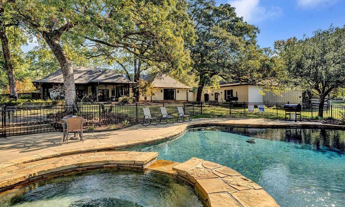 Tyler House | Discover a Piece of Paradise: Pool, Spa & Lake Access