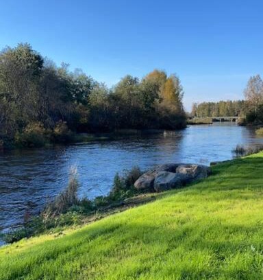 Kalajoki Apartment | Riverside Retreat: Guest Rated 9.7 with Pet-Friendly Options