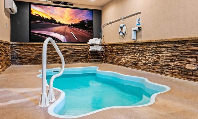 Pigeon Forge Cabin | Ultimate Smoky Mountain Pool Cabin with Theater Room