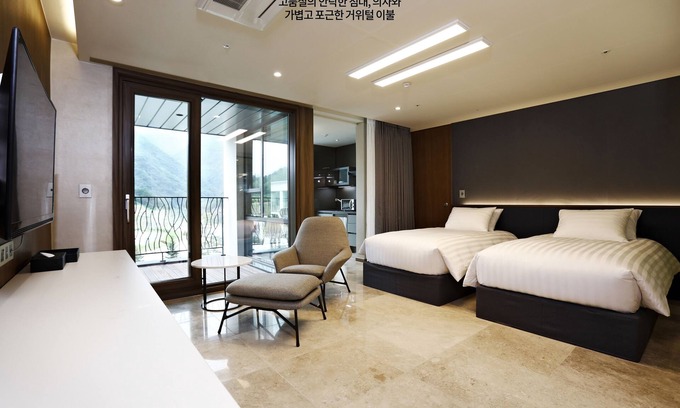 Jeongseon Apartment | Discover Pine Forest: Family-Friendly Getaway with Pool