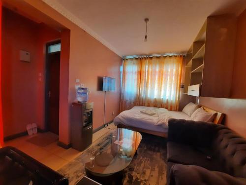 Kidono Apartment | Experience Pine Residency: Rooftop Views & Secure Parking