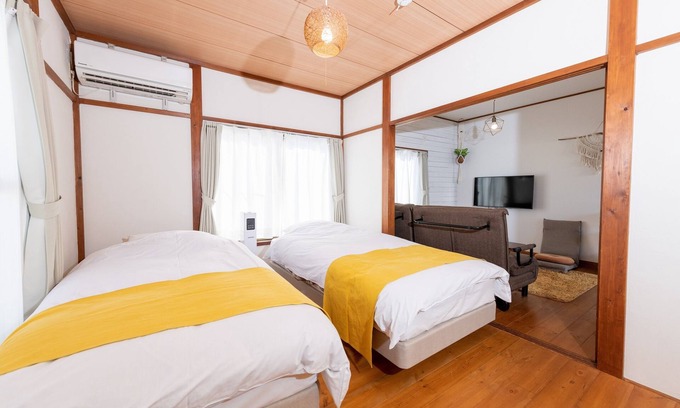 Koshigoe Apartment | Pine Tree Hotel: Oceanfront Getaway with Perfect Ratings
