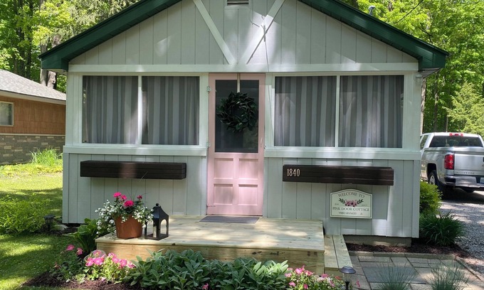 Gaylord Cottage | Experience Pink Door Cottage: Lake View & Pool Retreat