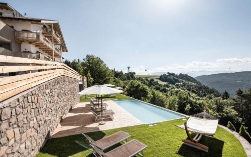 Soprabolzano Hotel | Experience Pippos Mountain Lodge with Oceanfront Views