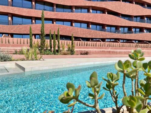 Guadalupe Apartment | Glamorous Poolside Retreat with Ocean Views