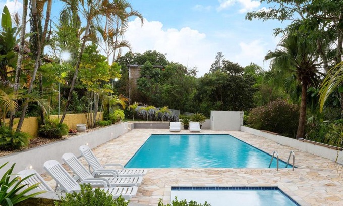 Guararema House | Discover Casa Ampla: Poolside Retreat in Guararema