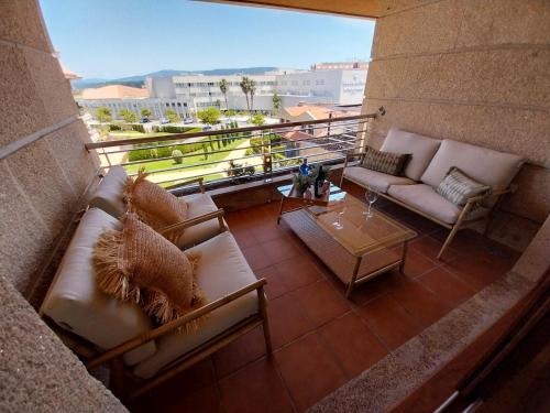 O Grove Apartment | Cozy Duplex Retreat at Isla de la Toja with Ocean Views