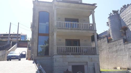 A Lanzada Apartment | Oceanfront Piso en A Lanzada with Private Beach Access