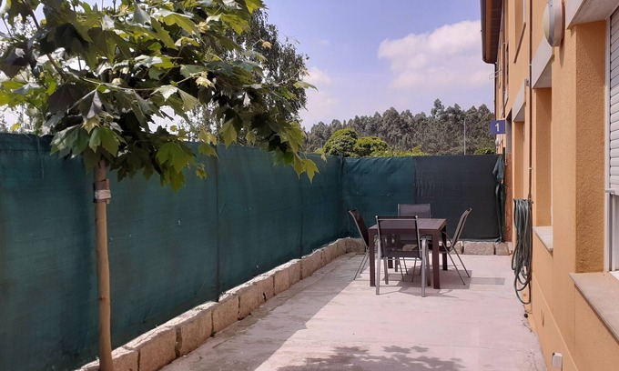 Mino Apartment | Relax in a 2-Bedroom Garden Apartment at Costa Miño Golf