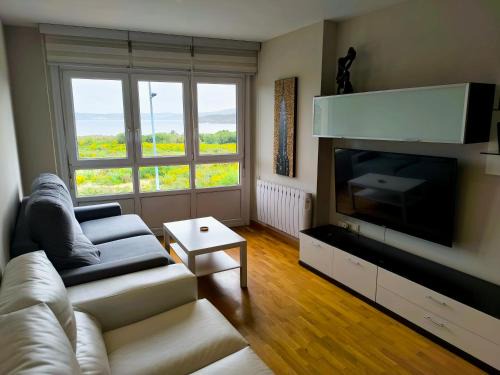 Laxe Apartment | Beachfront Retreat in Laxe with Ocean Views and Pet-Friendly