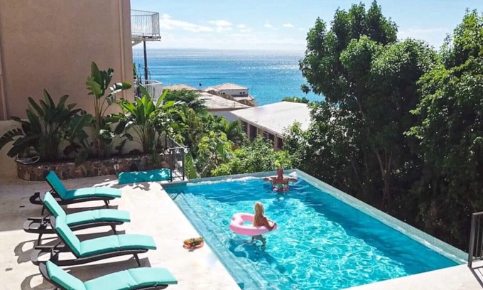 Estate Enighed Hotel | Indulge in the Oceanfront Pitaya 1 Suite at Seagrape Vista
