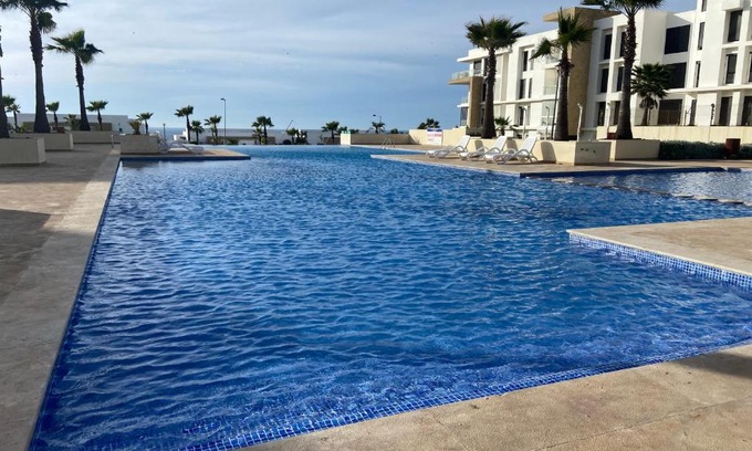 Souk Tlet El Gharb Apartment | Family-Friendly Retreat with Pool and Golf Access