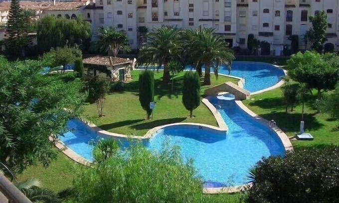 Platja de l'Arenal Apartment | Discover Planta Baja with Private Garden in La Isla