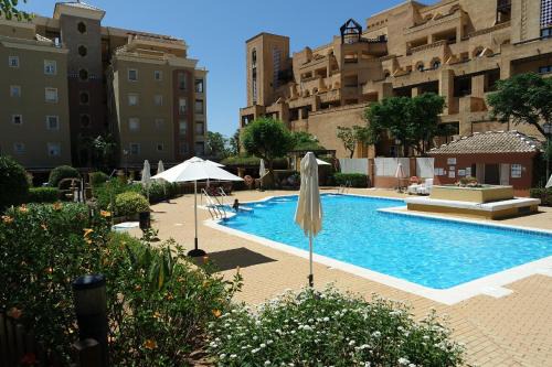 Punta del Moral Apartment | Family-Friendly Playa Canela I with Pool & High Ratings